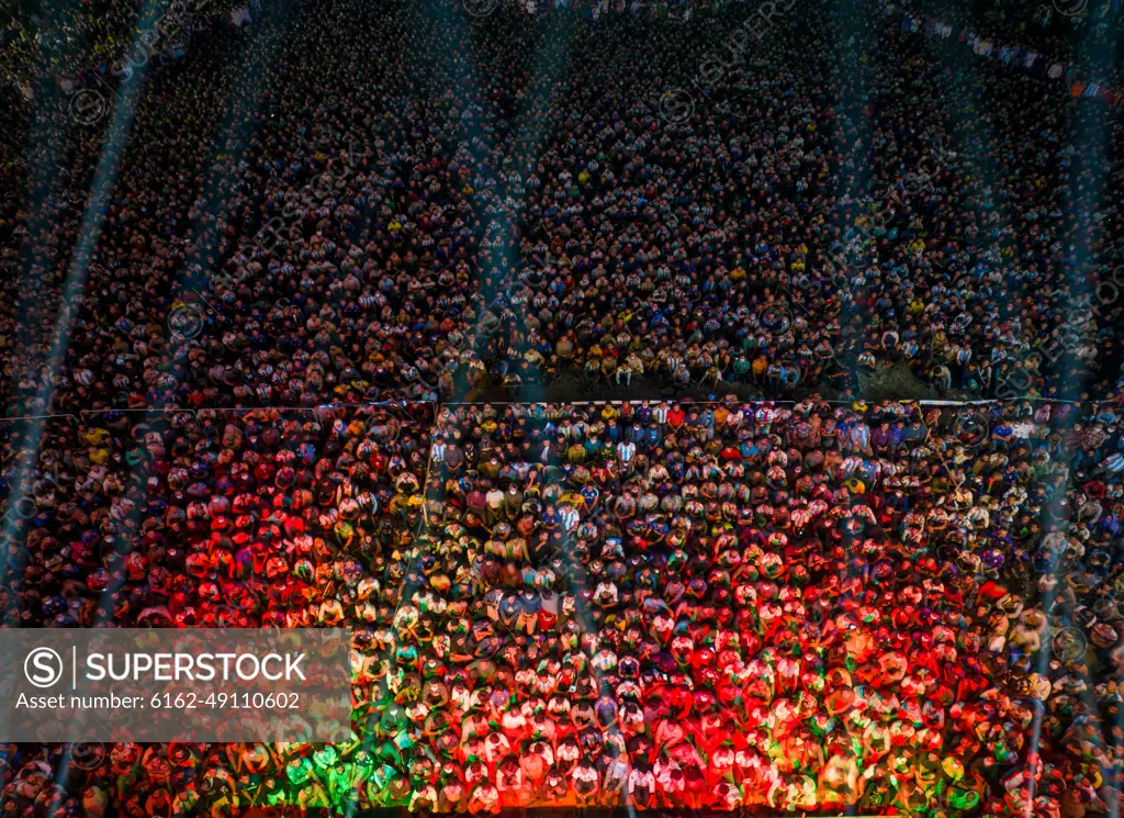 Aerial view of football fans watching football World Cup in the giant screen in Dhaka University Playground, Dhaka, Bangladesh.