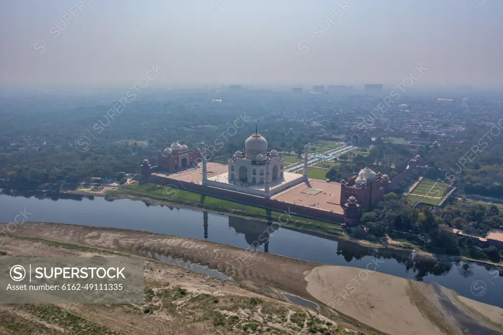 Aerial view of the Taj Mahal along Yamuna river, Agra, Uttar Pradesh, India.