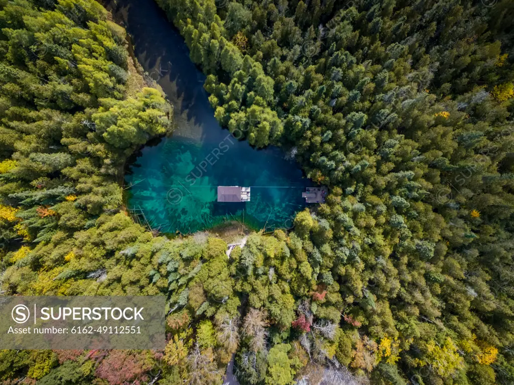 Aerial view of house on Kitch-iti-kipi lake also called The Big Spring, Michigan, USA.