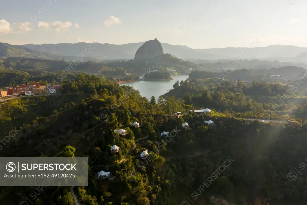 Aerial view of Bosko with Piedra del Penol in the background, Guatapé, Antioquia, Colombia