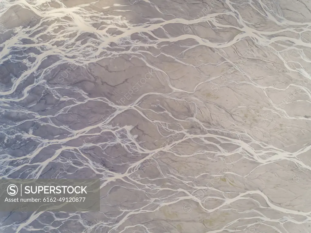 Aerial view above river creating an abstract pattern, Kachemak bay, Alaska.