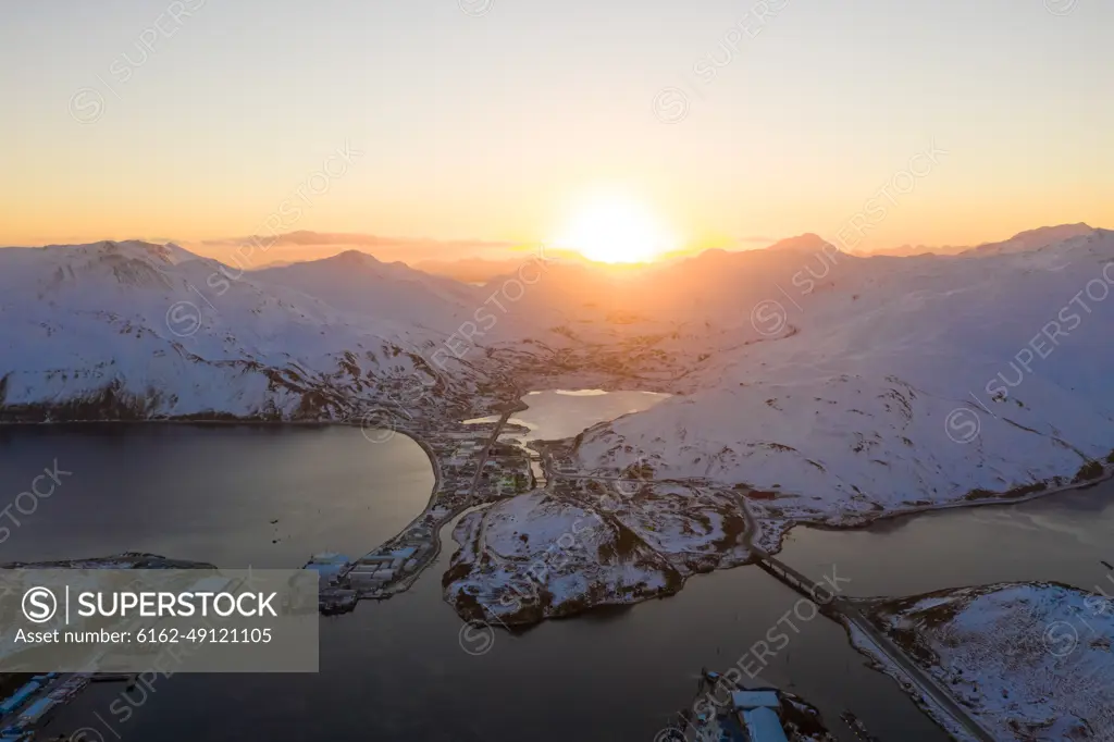 Aerial view of sunrise over the isolated city of Unalaska, AK, USA.