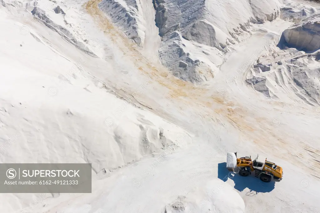 Aerial view of machines working at salt production facility, Australia.