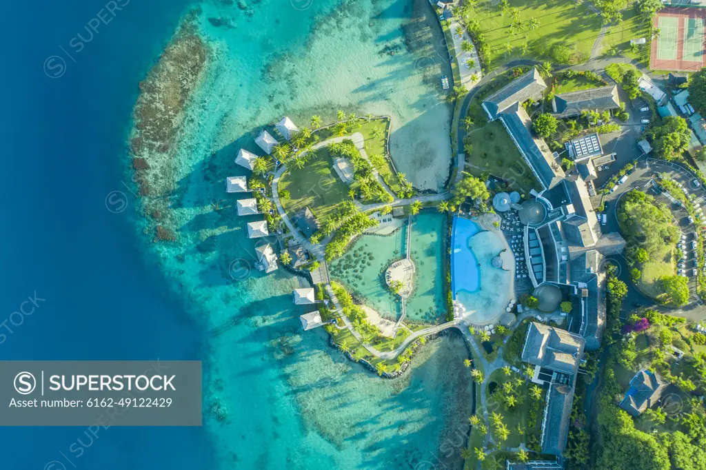 Aerial view of a luxury hotel with swimming pool in Tahiti, French Polynesia.