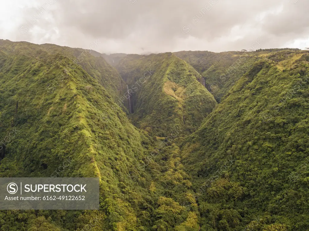 Aerial view of Tahiti mountains with stormy weather in French Polynesia.