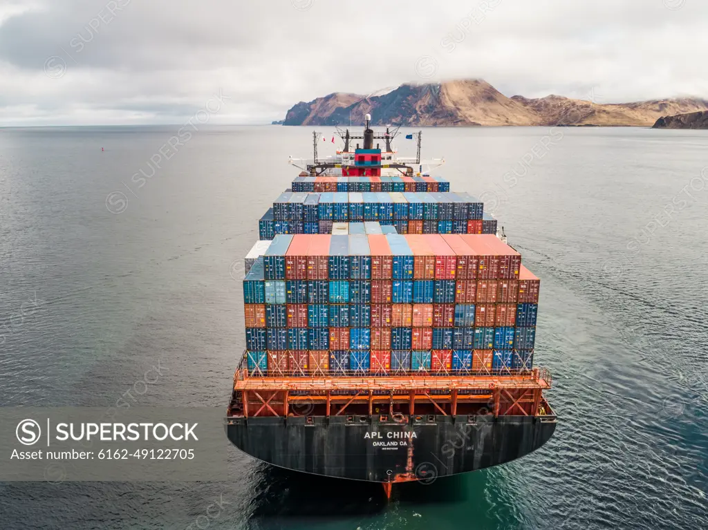 Aerial view of a shipping boat in Unalaska bay, USA