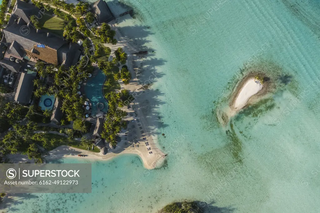 Aerial view of a beach along the coast in Bora Bora island, French Polynesia.