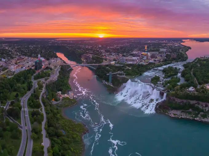 Aerial view of Niagara Falls, Canada-USA during scenic sunset.