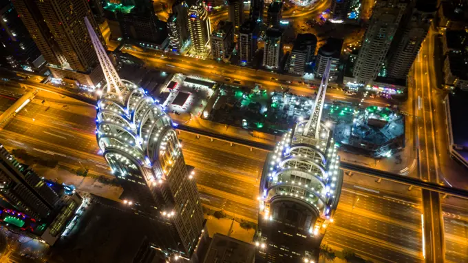 Aerial view of illuminated skyscrapers in Dubai at night, U.A.E.