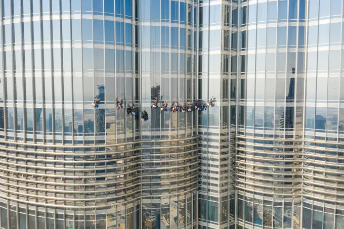 Aerial view of men working in the Burj Khalifa building, Dubai, United Arab Emirates