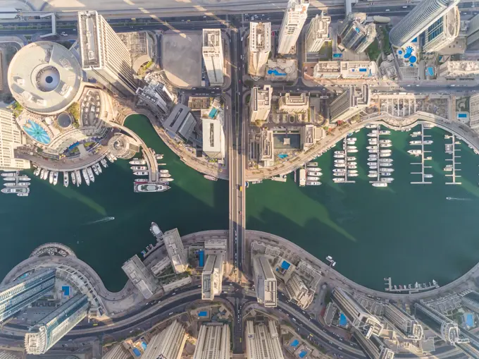 Aerial view of buildings and yachts in Marina Promenade, Dubai, United Arab Emirates