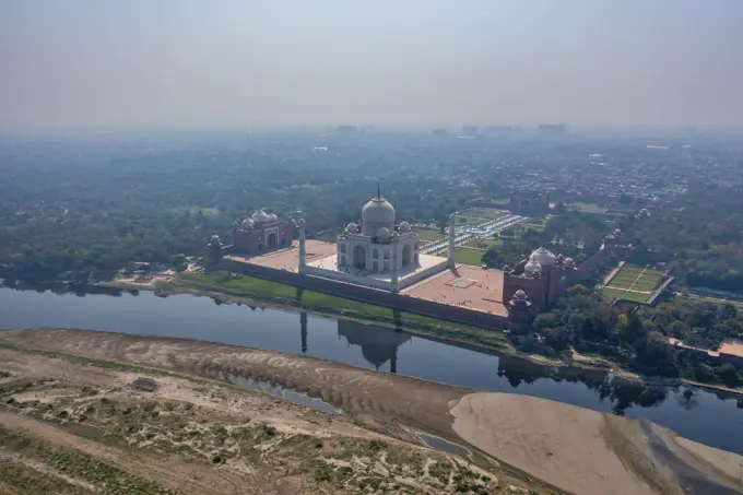 Aerial view of the Taj Mahal along Yamuna river, Agra, Uttar Pradesh, India.