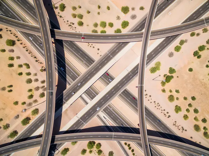 Aerial view of multi-lane road intersection on desert landscape, Las Vegas, USA.