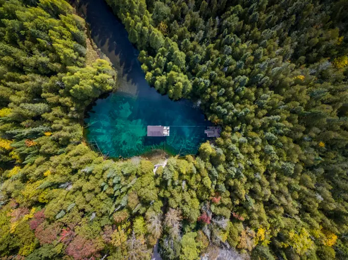 Aerial view of house on Kitch-iti-kipi lake also called The Big Spring, Michigan, USA.