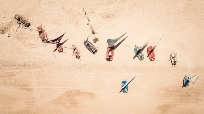 Aerial view of traditional fishing boats on the beach in Brazil.