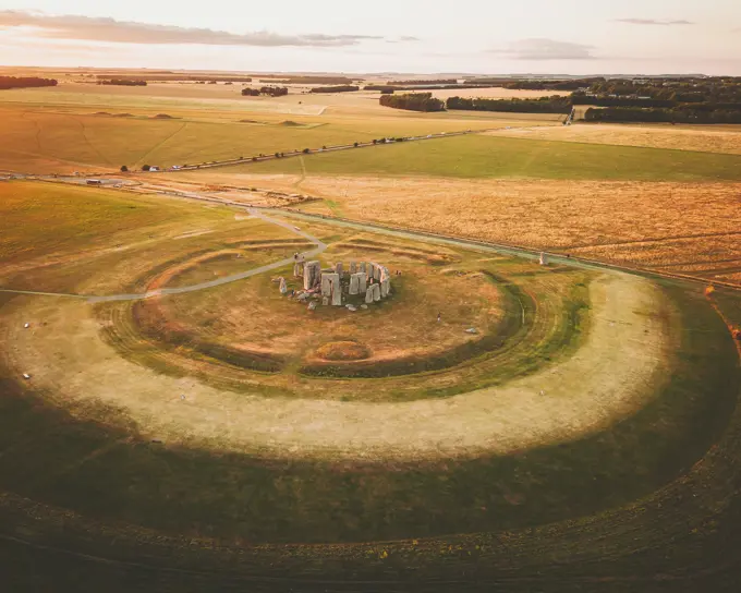 Aerial view of the famous Stonehenge rock sculpture at sunset, England, United Kingdom.