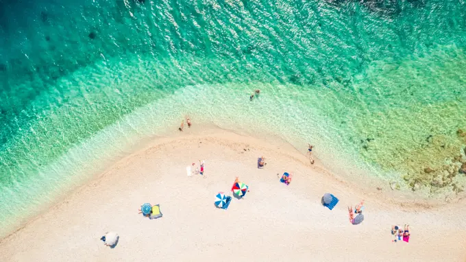 ITHACA ISLAND, GREECE - 7 August 2017 : Aerial photography of people on the beach of Agios Loannis, Ithaca Island, Greece.