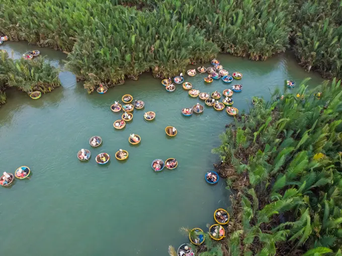 Aerial view of tourists at Coconut boats of Cam Thanh in Hoi An, Vietnam.