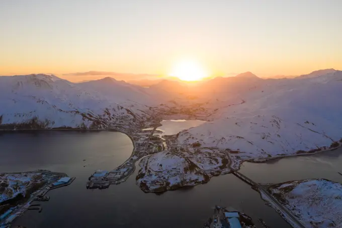 Aerial view of sunrise over the isolated city of Unalaska, AK, USA.