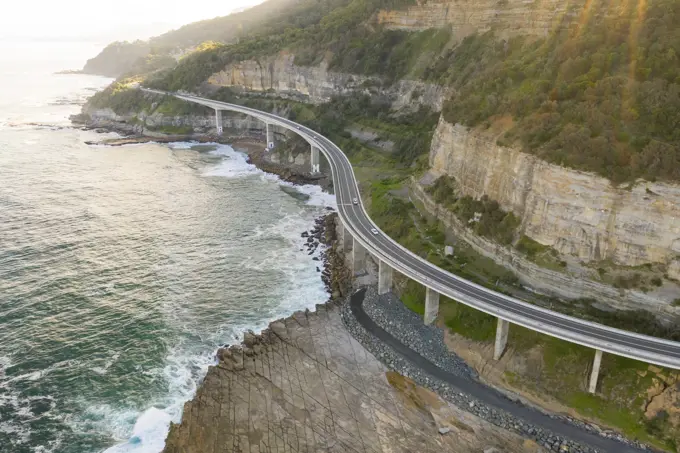 Aerial view of road crossing coastal line at New South Wales, Australia