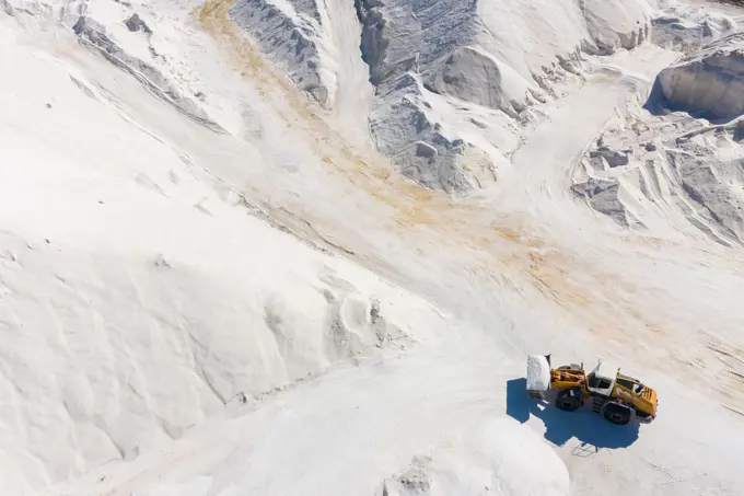 Aerial view of machines working at salt production facility, Australia.