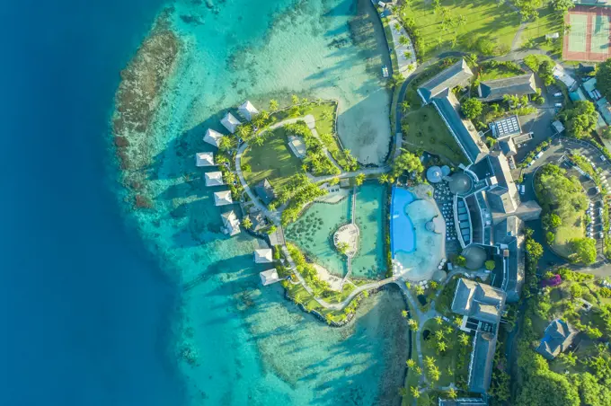 Aerial view of a luxury hotel with swimming pool in Tahiti, French Polynesia.