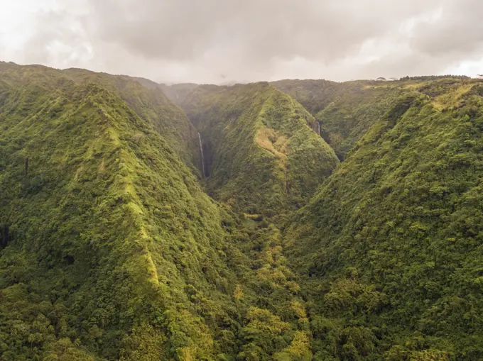 Aerial view of Tahiti mountains with stormy weather in French Polynesia.