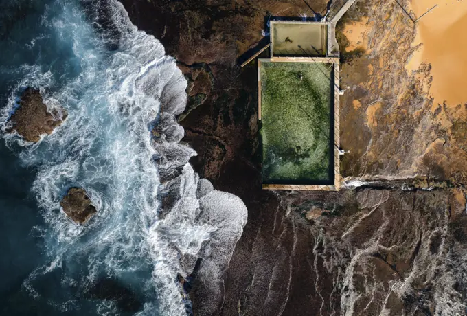 Aerial view of a natural rock pool along Robert Dunn Reserve coastline, Moan Vale, New South Wales, Sydney, Australia.