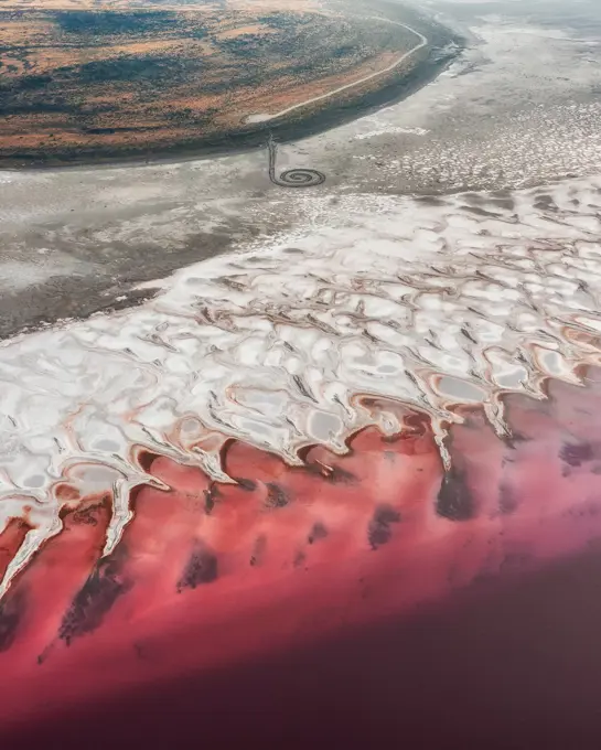 Aerial View of the famous earthwork sculpture made on the banks of the Great Salt Lake by Robert Smithson in the 1970 named the Spiral Jetty in Utah, USA