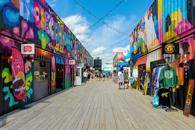 Saint John, NB, Canada - July 29, 2023: People and colorful shops inside the Waterfront Container Village in Saint John.