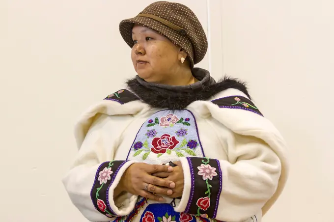 Inuit woman in traditional skin clothing. Grise Fjord, Nunavut, northernmost community in Canada