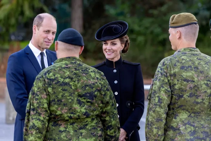 The Prince and Princess of Wales talking to members of the Canadian military as she meet troops from the Commonwealth, who have been deployed to the UK to take part in the funeral of Queen Elizabeth II, during a visit to the Army Training Centre (ATC) Pirbright in Guildford. Soldiers from Canada, Australia and New Zealand have gathered at Pirbright to rehearse their roles in the funeral on Monday. Picture date: Friday September 16, 2022.