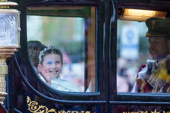 The Mall, London, UK. 6th May 2023. Her Royal Highness, Princess Charlotte of Wales, waving enthusiastically at the crowds along The Mall as she returns from Westminster Abbey in the carriage procession following the coronation of her grandfather, King Charles III.   Photo by Amanda Rose/Alamy Live News