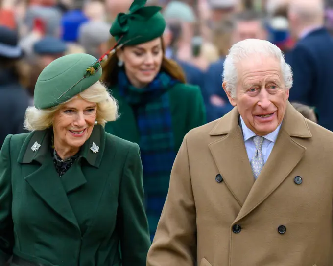 Sandringham, Norfolk UK. 25 Dec 2024. Their Majesties King Charles and Queen Camilla lead the royal family in their traditional walk to St. Mary Magdalene Church on the Sandringham Estate for the Christmas morning service. The Queen and Princess of Wales are dressed in matching green outfits. Credit: MartinJPalmer/Alamy Live News