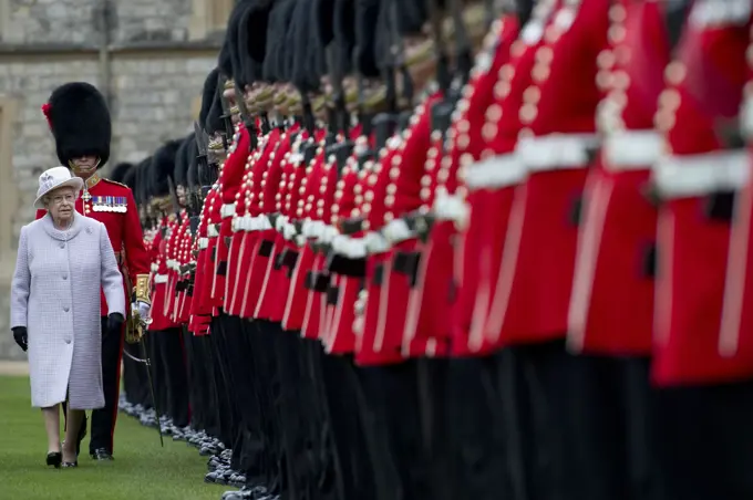 Queen presents colours to Coldstream Guards