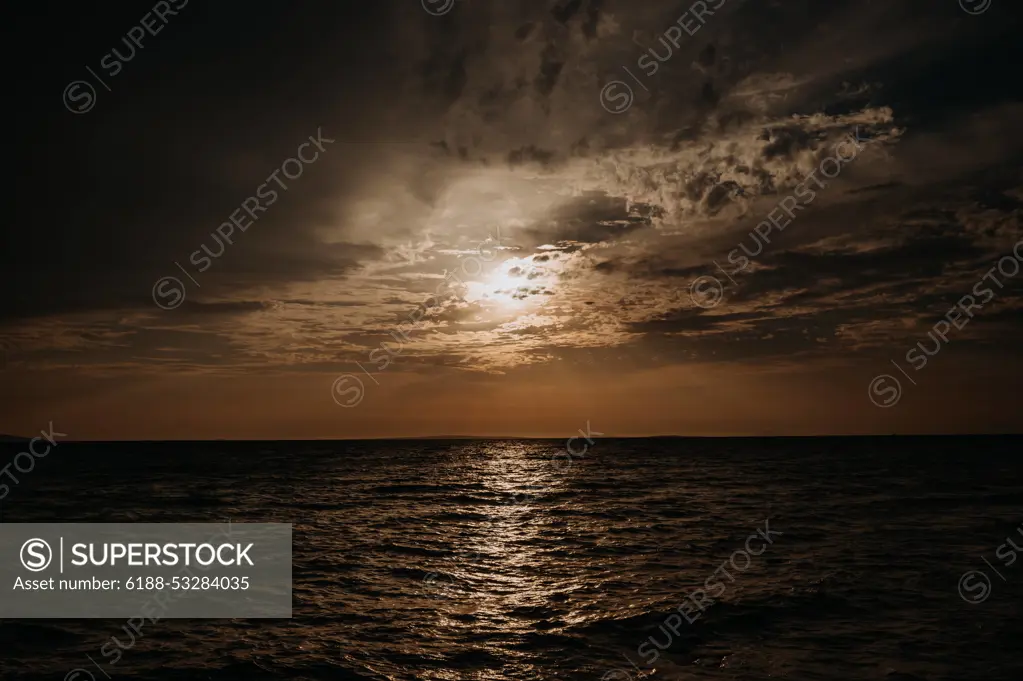 Beautiful landscape of Croatia, Croatia coast, sea and setting sun. Beautiful landscape of Croatia, Croatia coast, sea and clouds, during sunset. model released