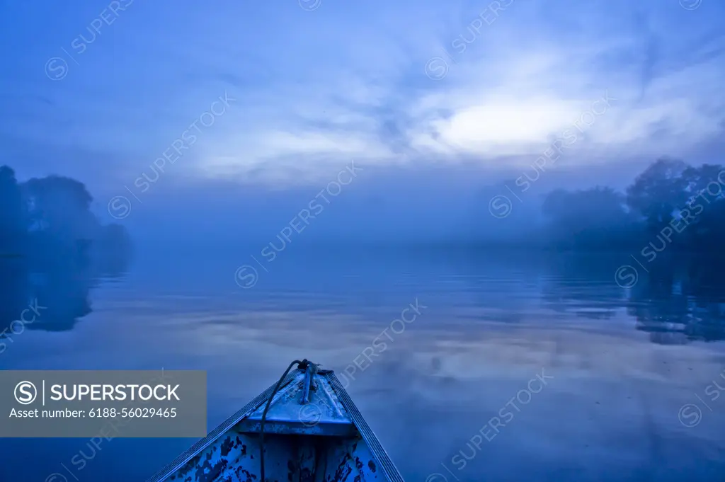 Sunrise foggy Riverside jungle reflection, Amazon Basin, Brazil Sunrise, Amazon Basin, Brazil Copyright: xZoonar.com/AndreasxGiannakisx 6516920