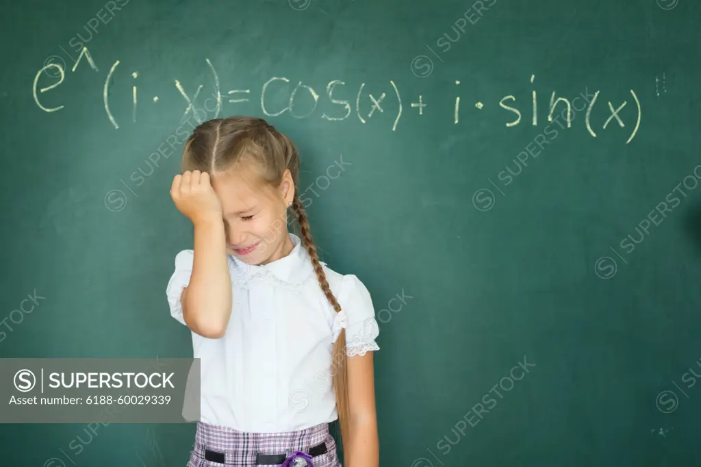 Child girl schoolgirl and compound formula on the chalkboard. Complex school program does not match the age of the child Child girl schoolgirl and compound formula on the chalkboard. Complex school program, does not match the age of the child ,model released, Symbolfoto Copyright: xZoonar.com/AlikxMulikovx 17432508 ,model released, Symbolfoto ,property released