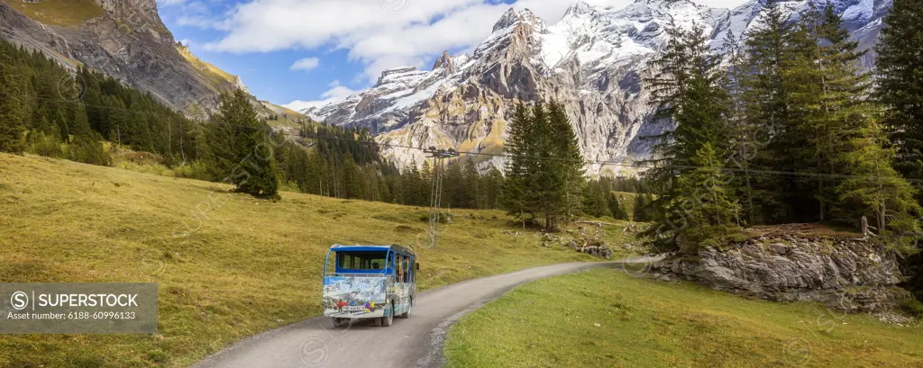 Oeschinensee electric car bus, Switzerland Kandersteg, Switzerland - October 17, 2019: Oeschinensee electric car bus on the pathway to Oeschinen lake and Swiss Alps panorama, Berner Oberland Copyright: xZoonar.com/Nataliya_Nazarovax 21697914