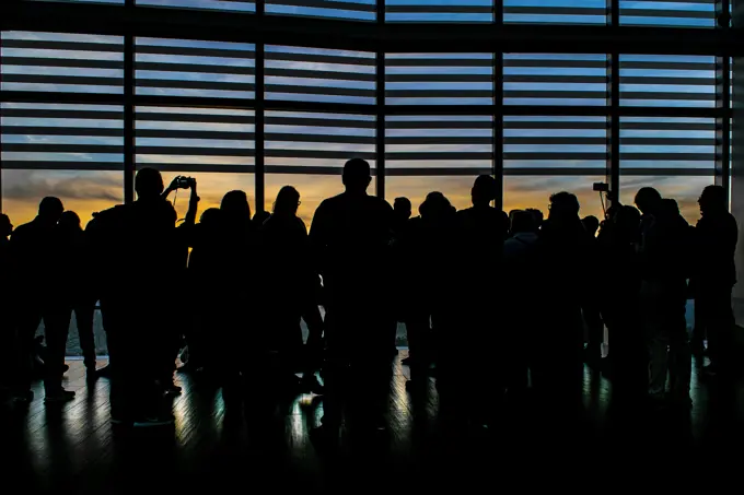 People at Modern Tower Viewpoint, Santiago de Chile SANTIAGO DE CHILE, CHILE, MAY - 2018 - High contrast group of people silhouette watching the view of the city at tower viewpoint in santiago de chile city, Chile Copyright: xZoonar.com/DanielxFerreira-LeitesxCiccarinox 13432841