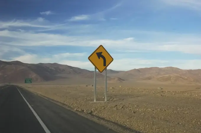 Road sign in Chile Road sign in the desert of Chile Copyright: xZoonar.com/LeonardoxBrigantix 8780917