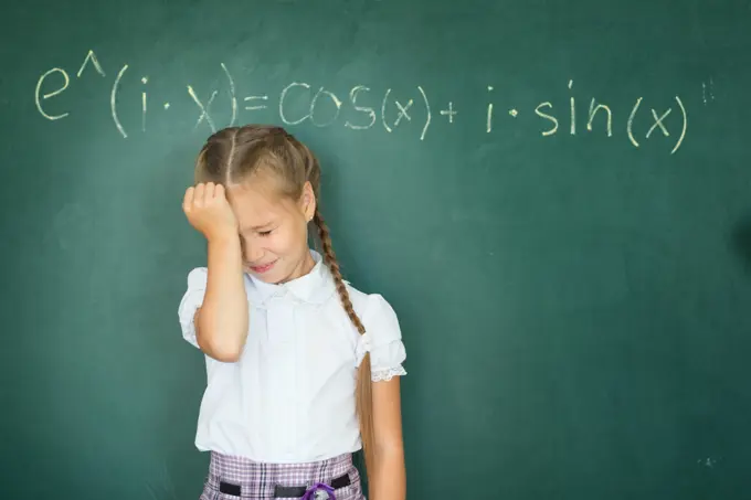 Child girl schoolgirl and compound formula on the chalkboard. Complex school program does not match the age of the child Child girl schoolgirl and compound formula on the chalkboard. Complex school program, does not match the age of the child ,model released, Symbolfoto Copyright: xZoonar.com/AlikxMulikovx 17432508 ,model released, Symbolfoto ,property released