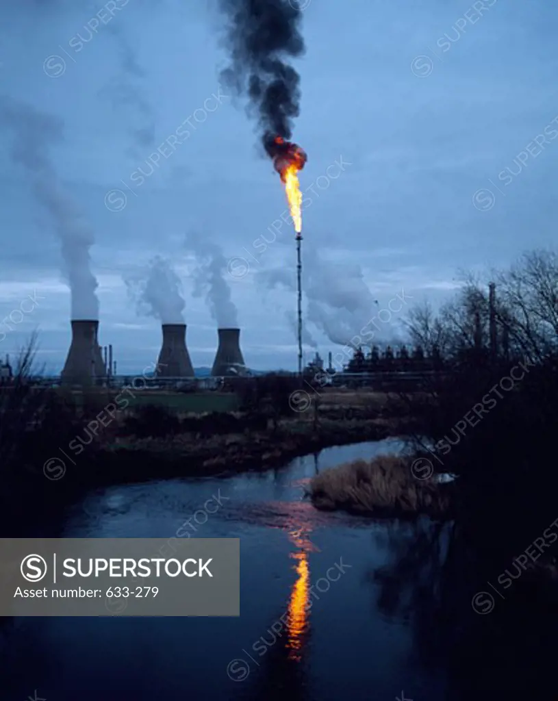 Smoke with flame emitting from an oil refinery, Scotland