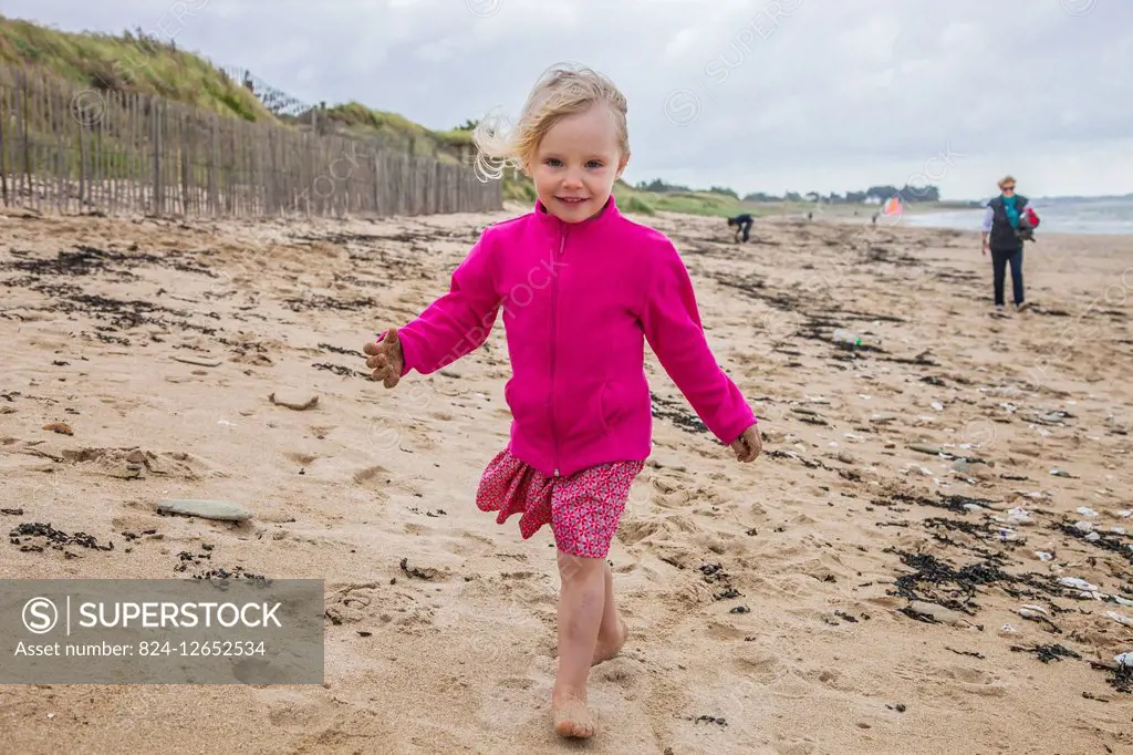 CHILD AT THE SEASIDE