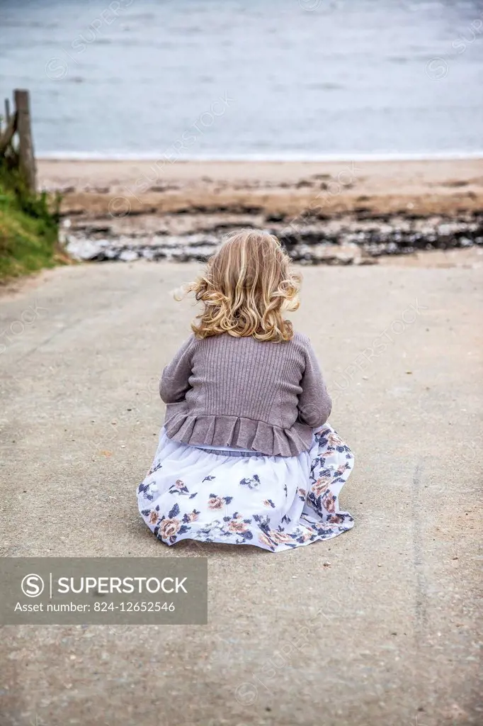 CHILD AT THE SEASIDE