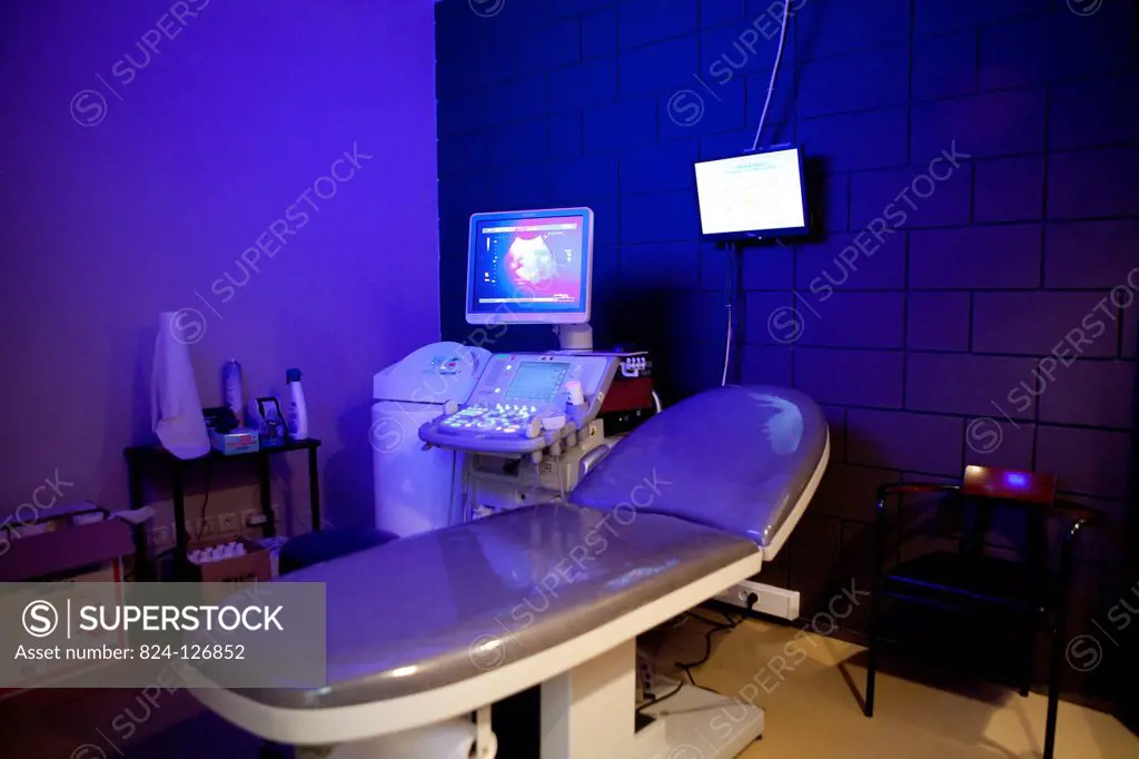 Digital medical imaging centre in Paris, France. Ultrasound scan room.