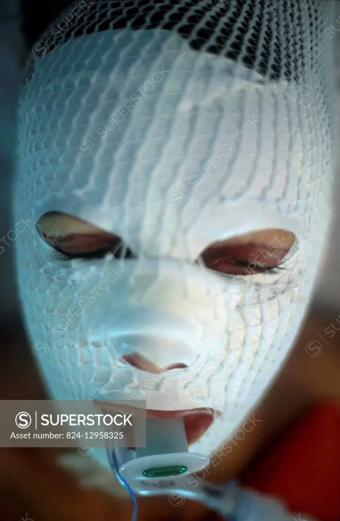 Reportage on plastic surgery. Bandage after a laser face lift and blepharoplasty.