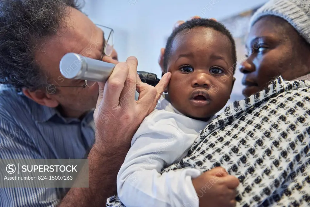 Reportage on a pediatrician who specializes in attachment theory in Lyon, France. A consultation at 10 months old. ENT examination.