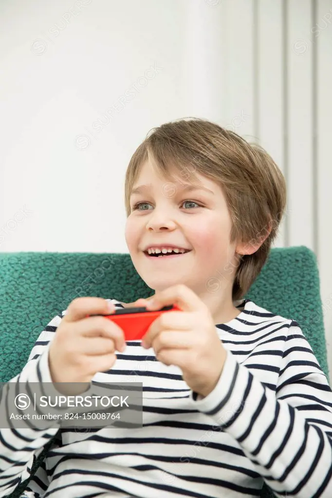 Boy playing video game.