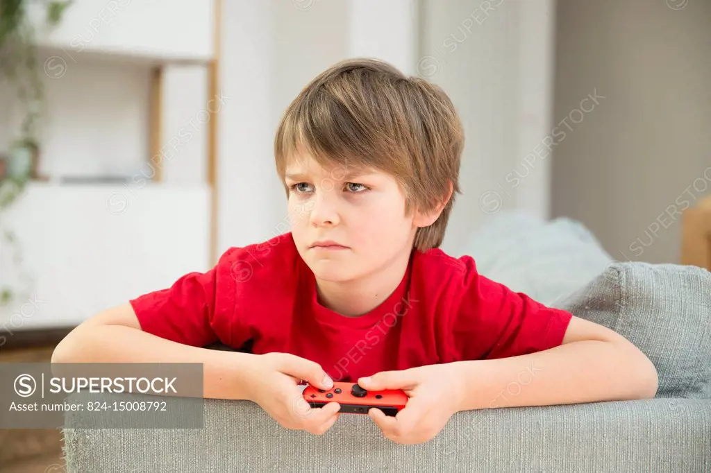 Boy playing video game.